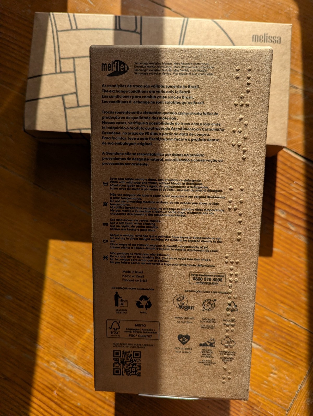 This Melissa sandals box is Brailled (has tactile Braille imprinted on it)