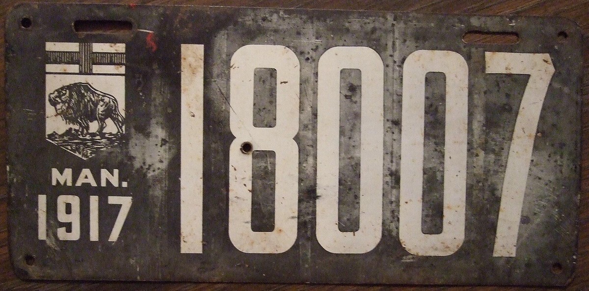 Manitoba License Plate numbered 18007 from 1917. 

From Jerry "Woody", Wikimedia Commons

Creative Commons Attribution-Share Alike 2.0 