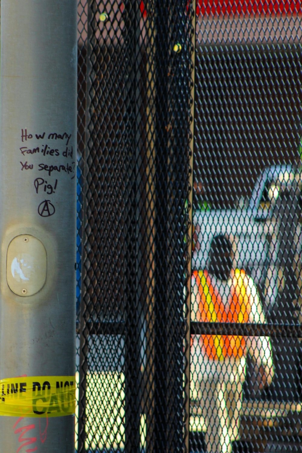 Fascist paramilitary invaders constructed a new fence (again) around their hideout in Los Angeles, CA