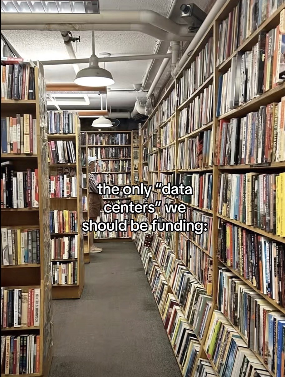 A photo inside a bookstore with the caption ‘the only "data centers" we should be funding:’